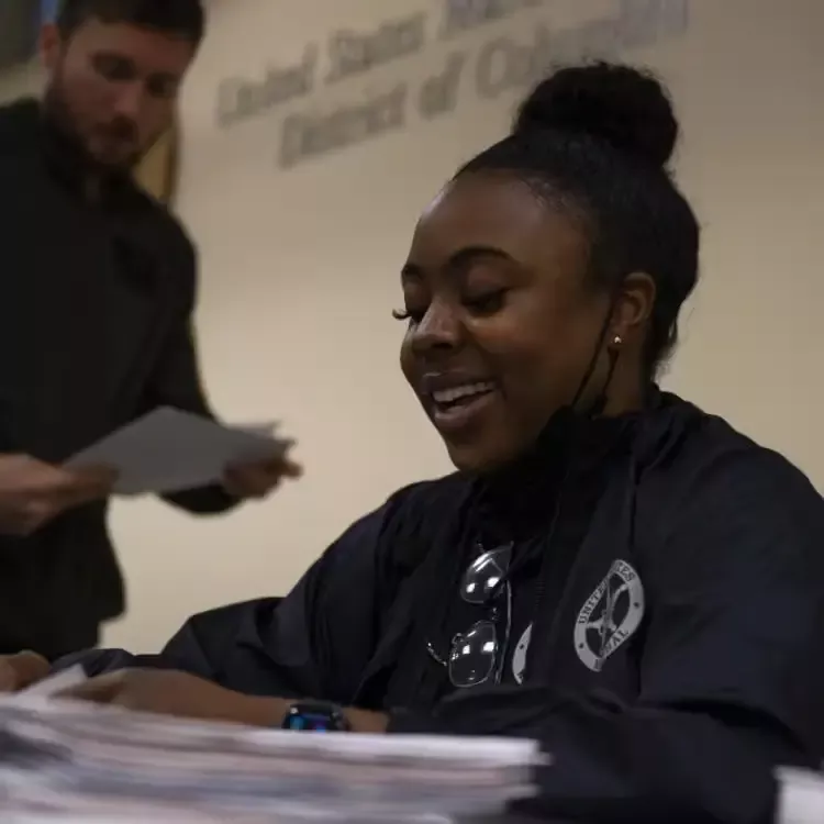 A female U.S. Marshal in an administrative position